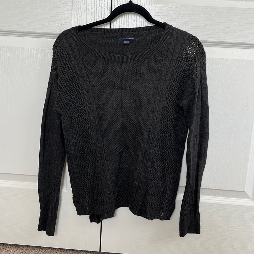 American eagle knitted sweater. Charcoal grey. Used but in good condition. XS